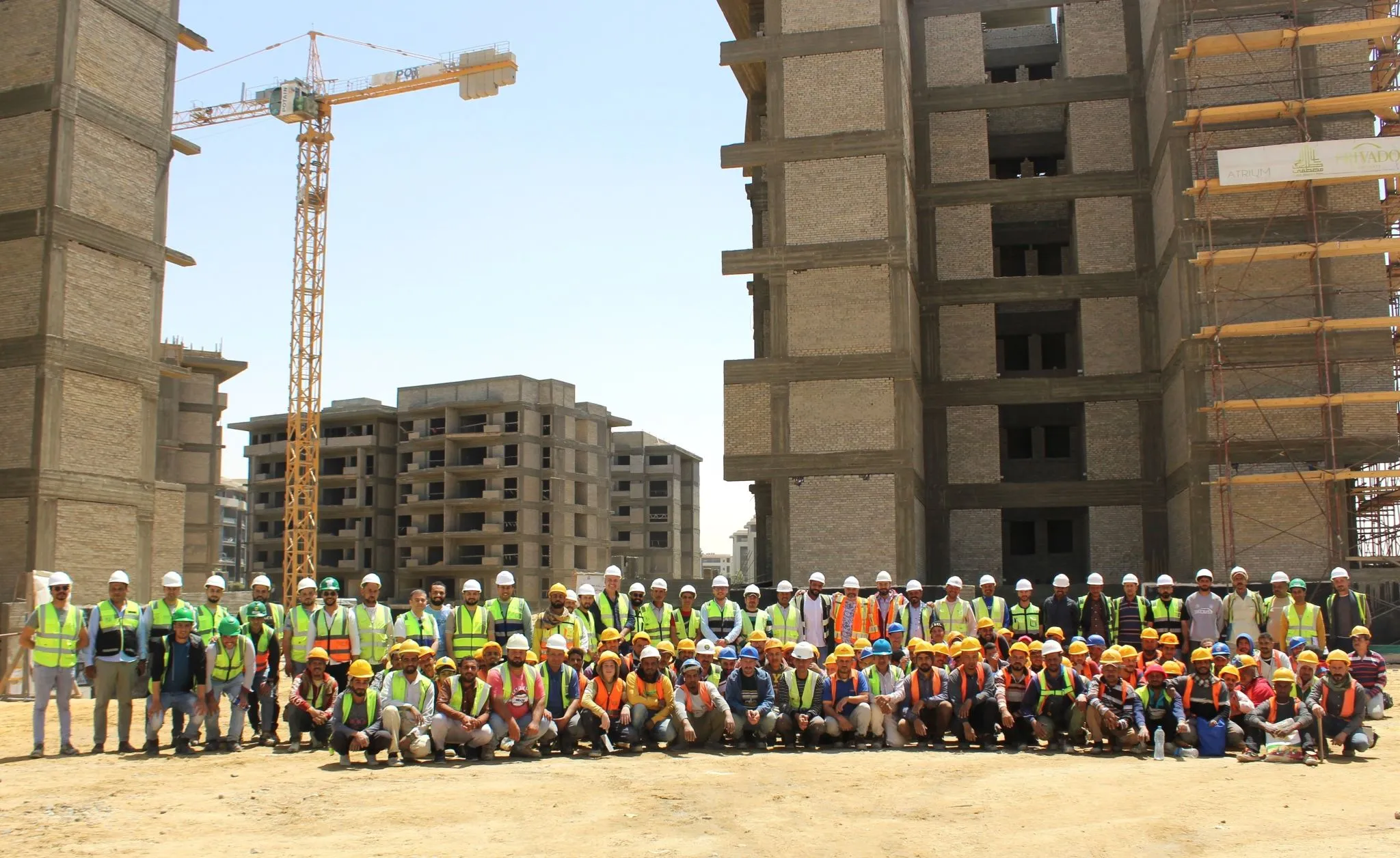 Atrium site teams in full personal protective equipment